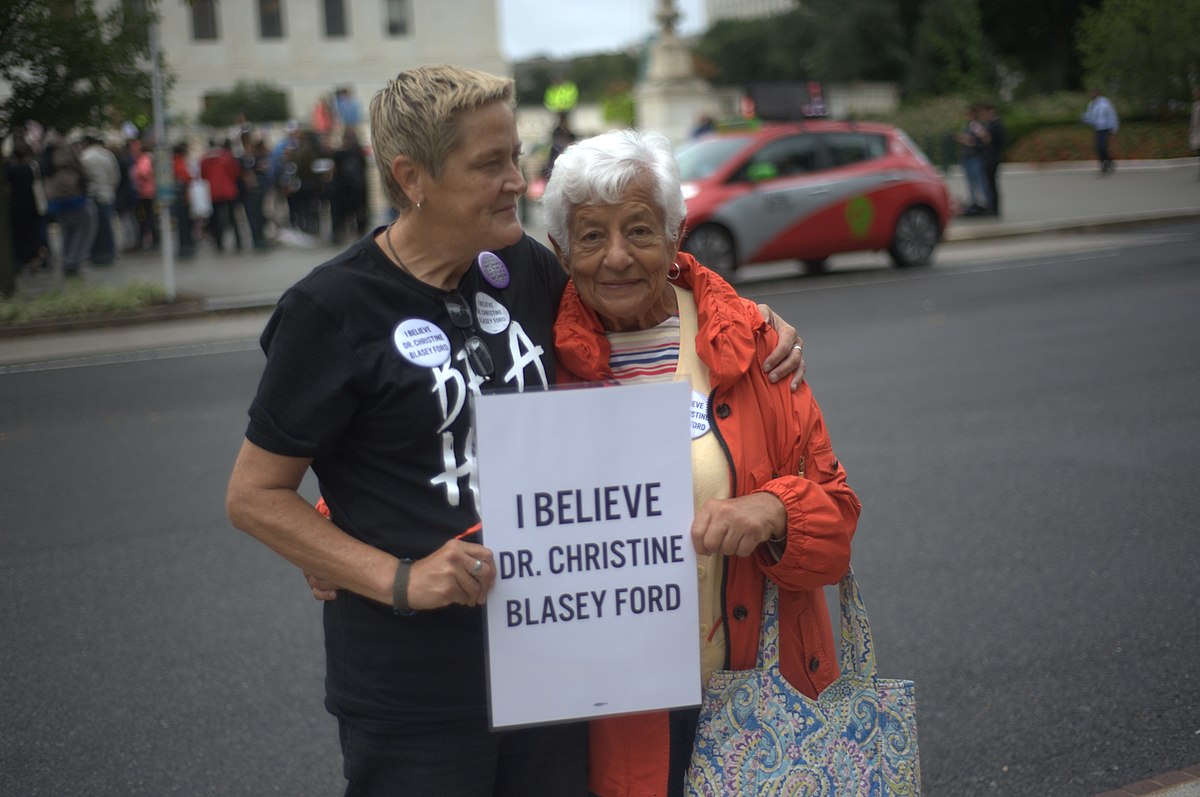 Kavanaugh_rally_at_Supreme_Court_-_two_women_with_sign